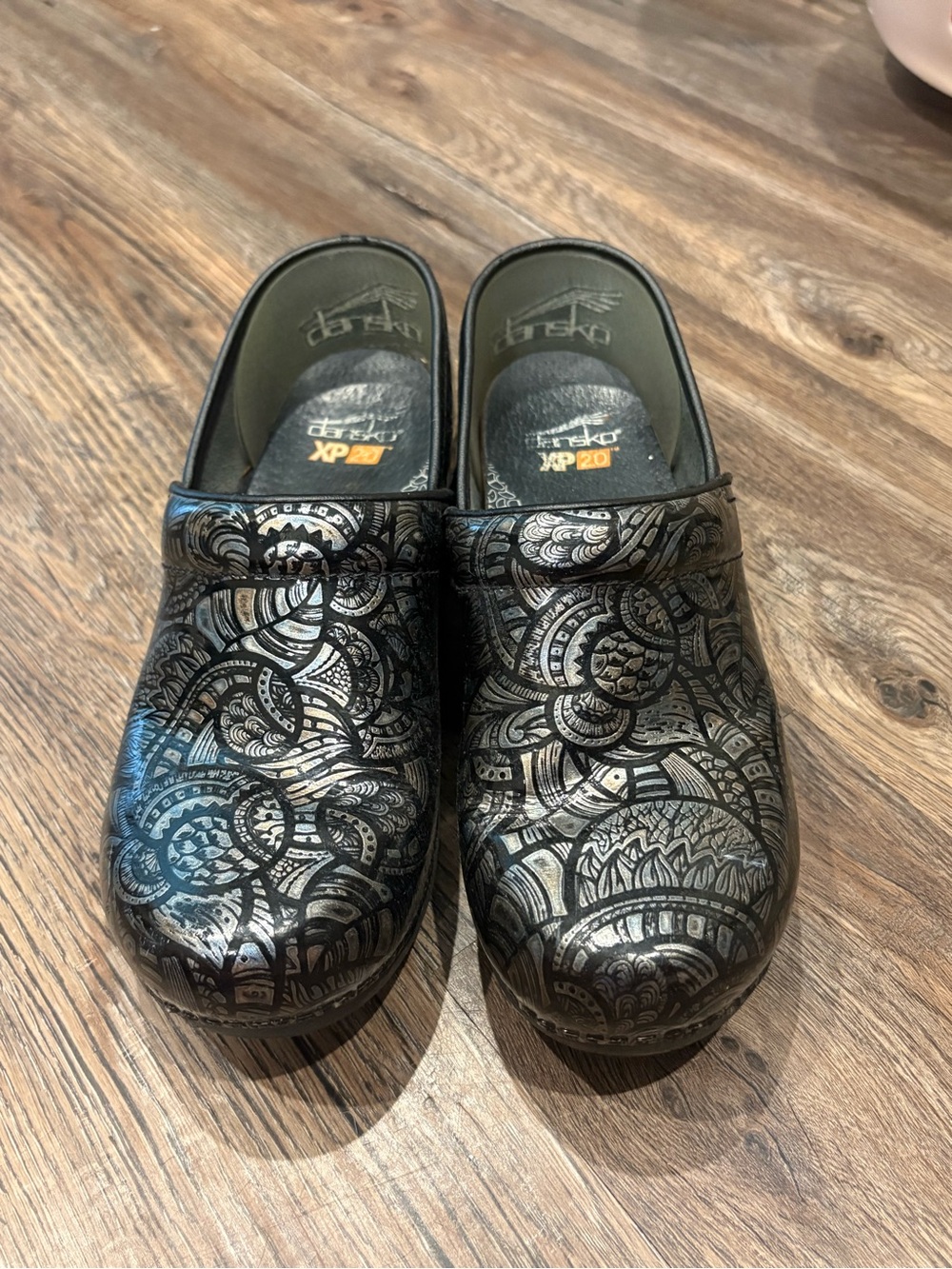 Dansko Black Clogs with Silver Floral Scroll Pattern